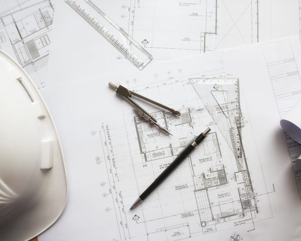 Image of engineering objects on workplace top view.Construction concept. Engineering tools.Vintage tone retro filter effect,soft focus(selective focus)